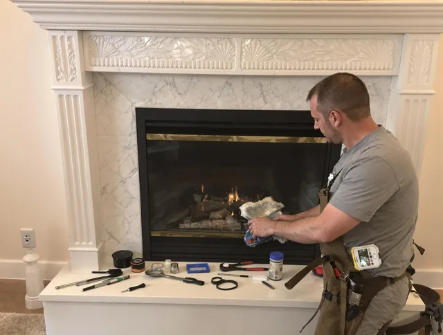 Wethersfield Chimney Sweep performing fireplace maintenance in Wethersfield, CT